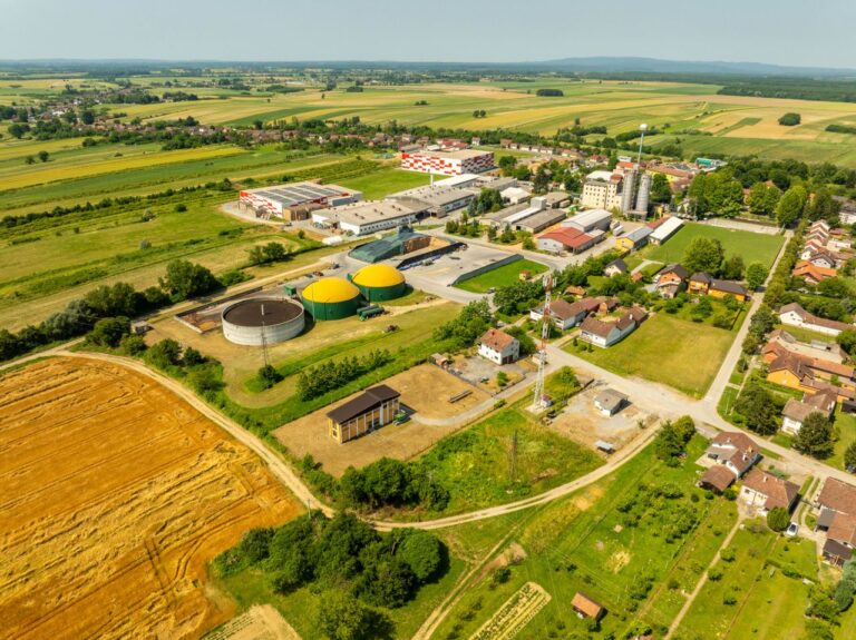 Aerial shot of Hercegovac, Croatia, showing industrial and agricultural landscape.